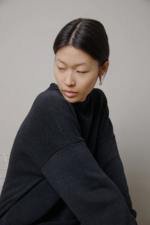 Micaela Greg - Faded Black Rolled Sweater